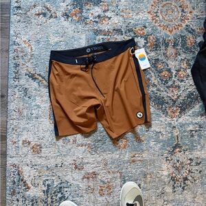 Vuori Tan and Black Performance Shorts